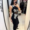 Rochie neagra din tricot cu flori argintii