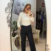 Costum bleumarin cu pantalon evazat
